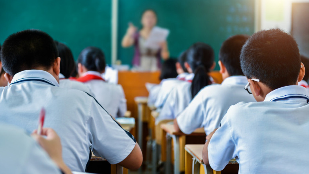 Doi adolescenți din China condamnați după uciderea unui coleg de clasă pentru bani