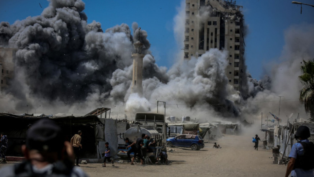 Israelul demolează zeci de clădiri în Gaza înaintea ofensivei terestre